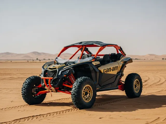 Off-road dune buggy parked on the sand